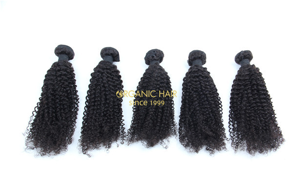 Curly black remy human hair weave 